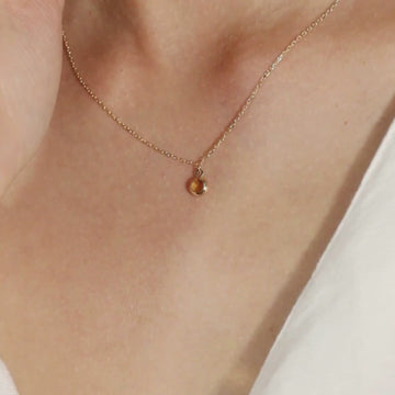 Birthstone Sphere Necklace Citrine 14k gold stacked on model neck, video – Foundry