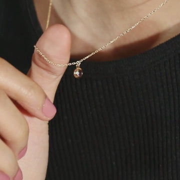 Birthstone Sphere necklace 14k gold stacked on model neck, video – Foundry