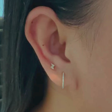 Pave Diamond Huggie Hoops 18k gold stacked on model ears, video – Foundry