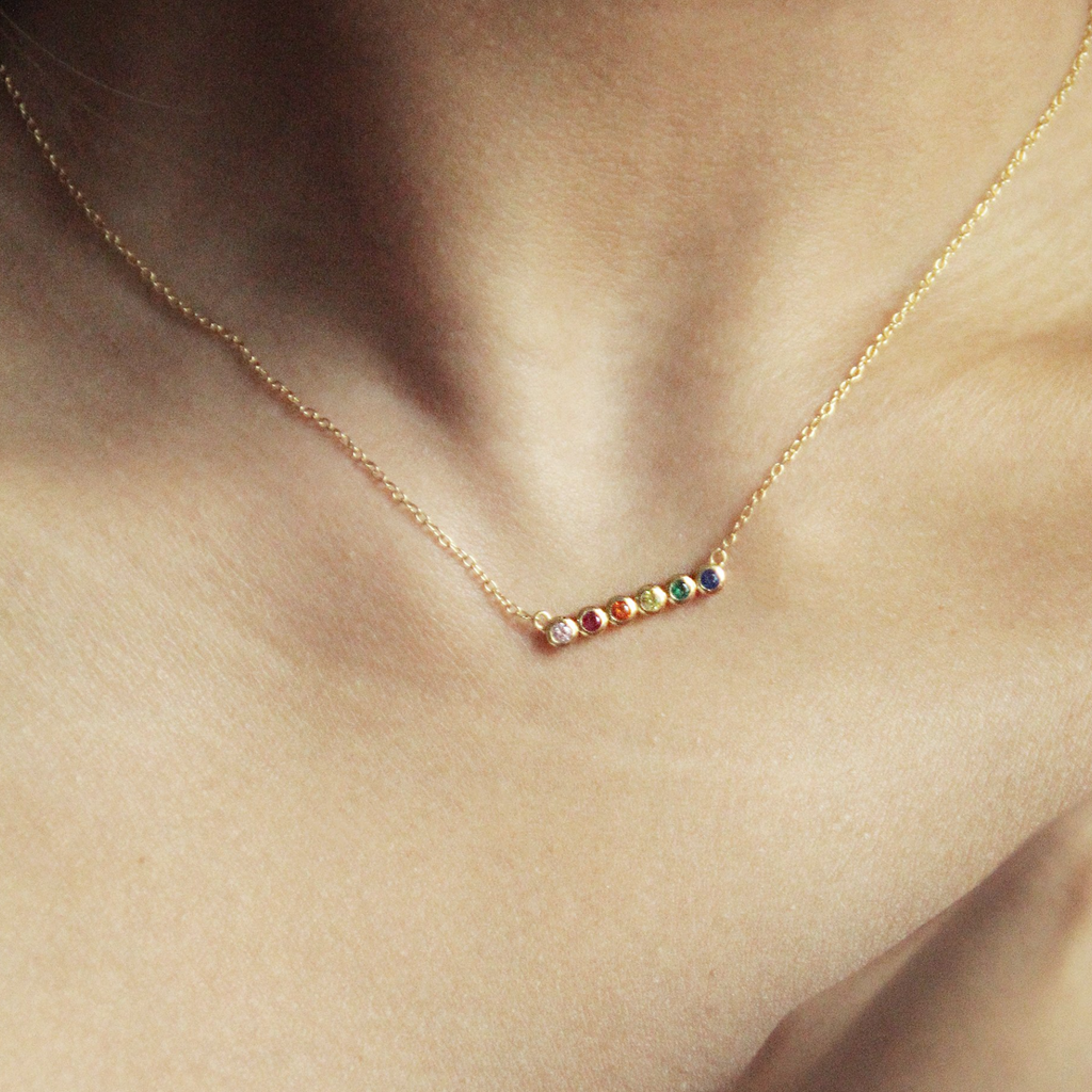 Rainbow Bezel Necklace Sterling Silver stacked on model neck– Foundry