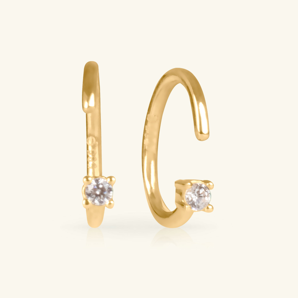 Close-up of fish hook on Reversible Solo Huggie Hoops 14k gold – Foundry