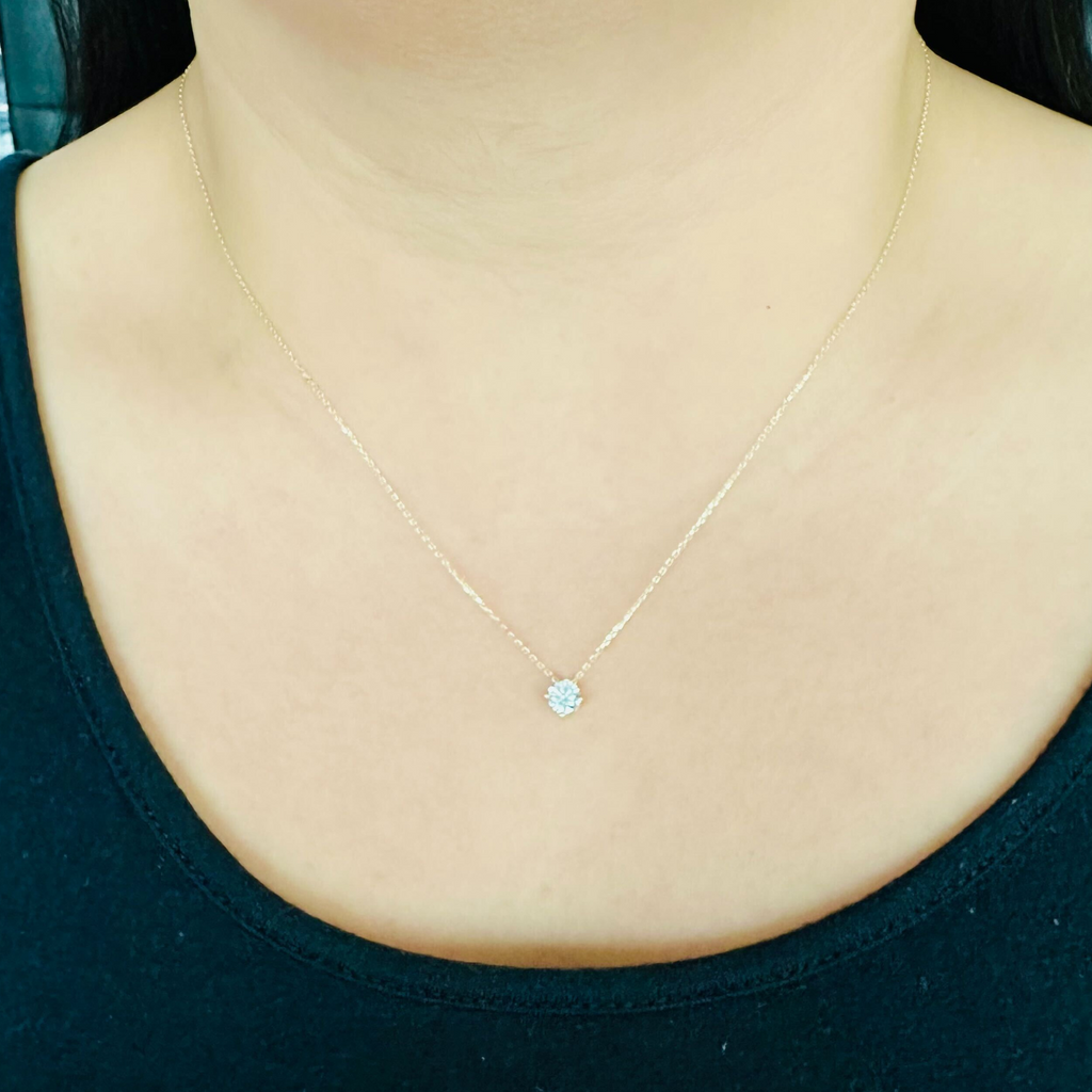 Round Necklace 14k gold stacked on model ears – Foundry