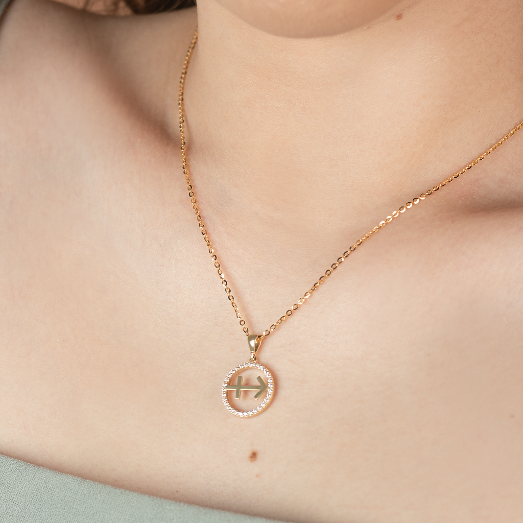 Sagittarius Pendant 14k gold stacked on model neck – Foundry