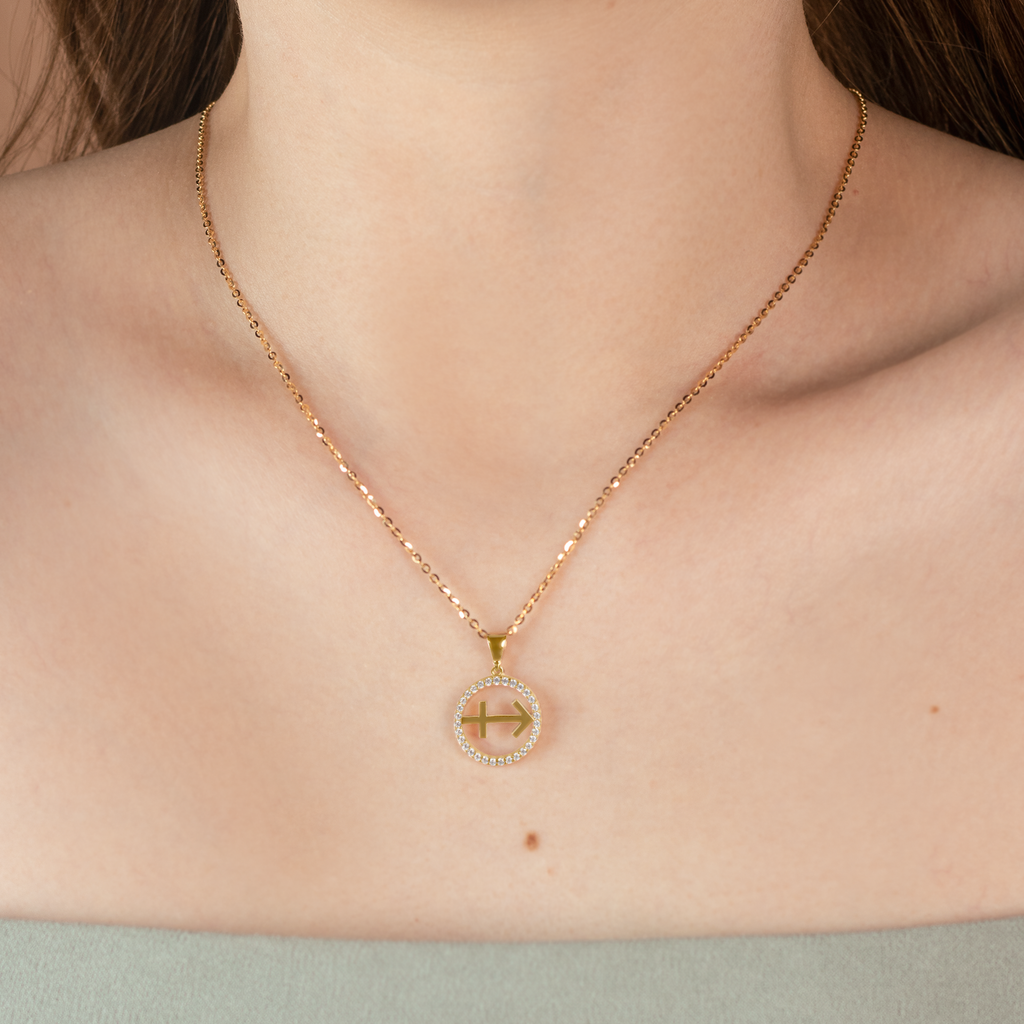 Sagittarius Pendant 14k gold stacked on model neck – Foundry