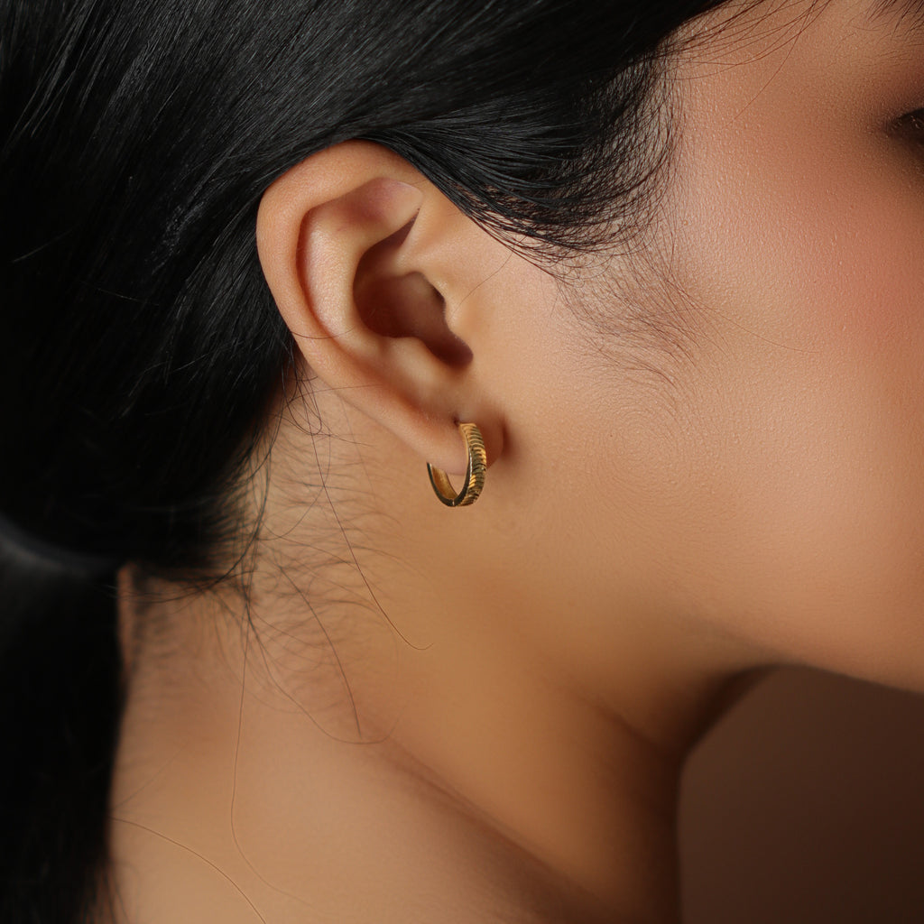 Scalloped Hoops 18k gold stacked on model ear – Foundry