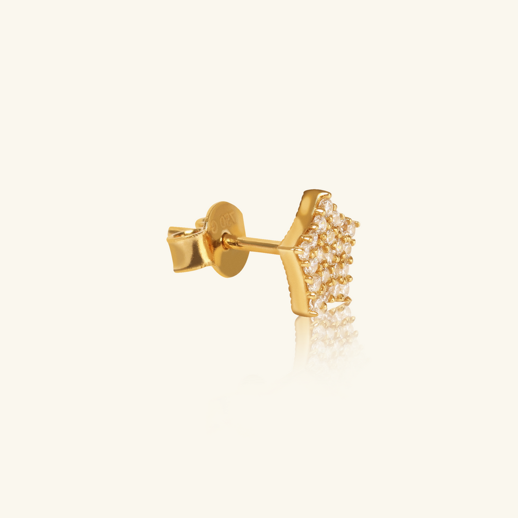 Close-up of push back post lock on Single Pave wide Star Studs 18k gold – Foundry