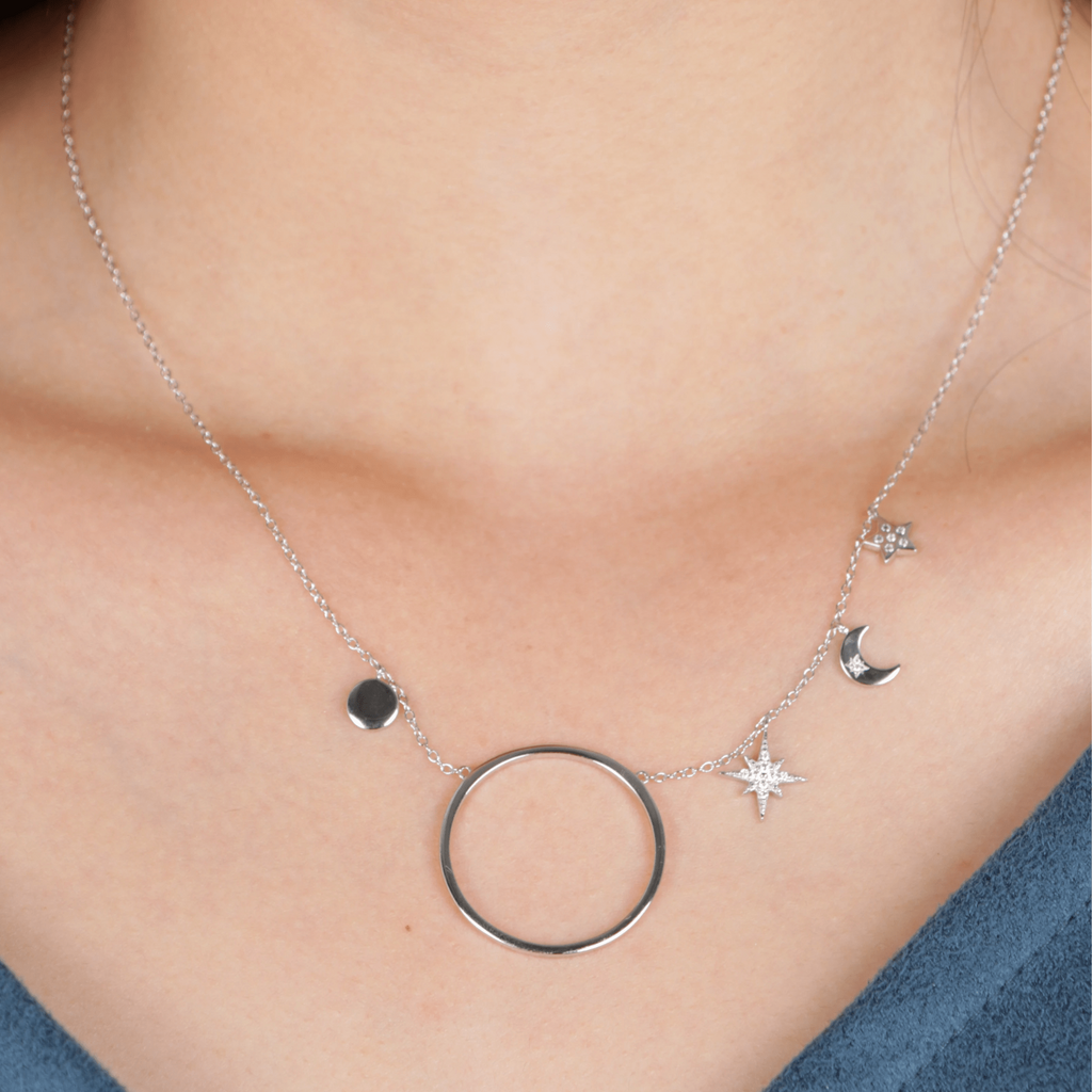 Sky Halo Necklace Sterling Silver stacked on model neck – Foundry