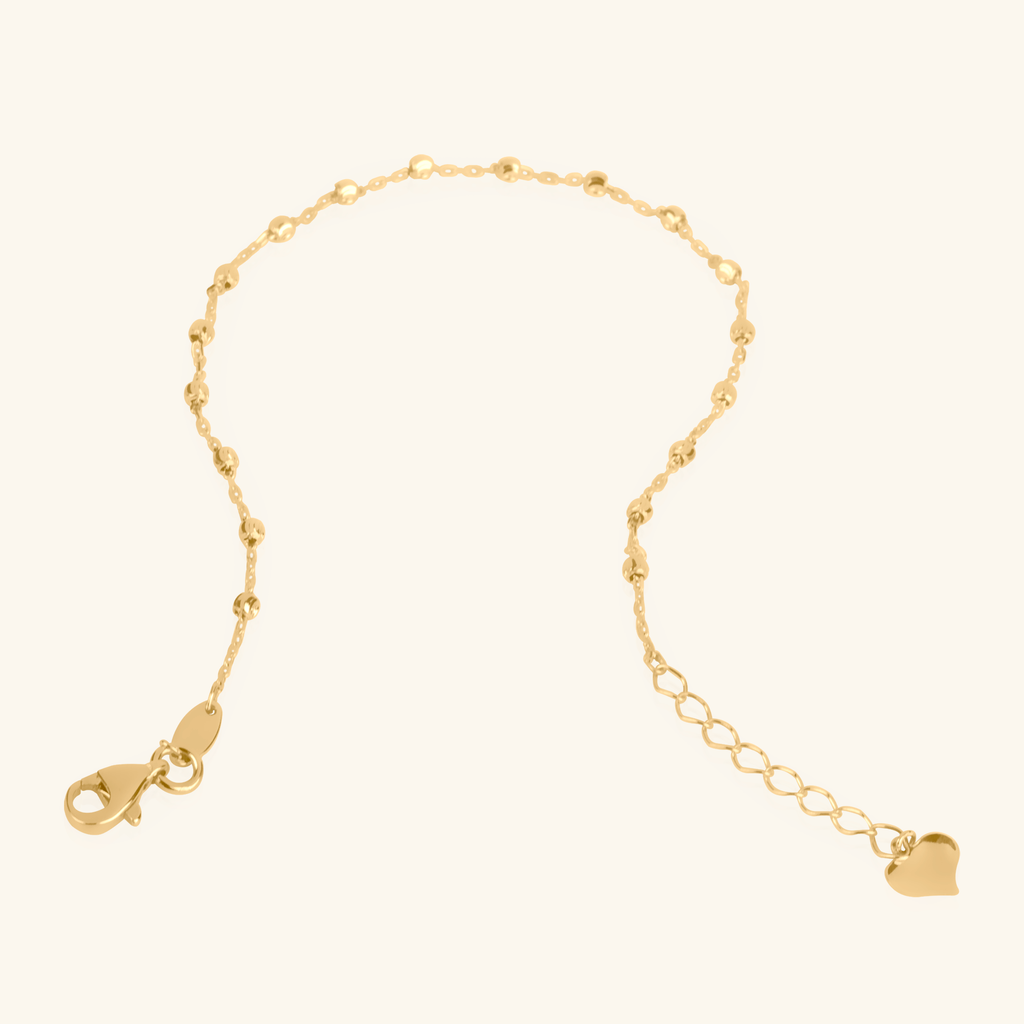 Close-up of lobster clasp on Small Beads Bracelet 14k gold – Foundry