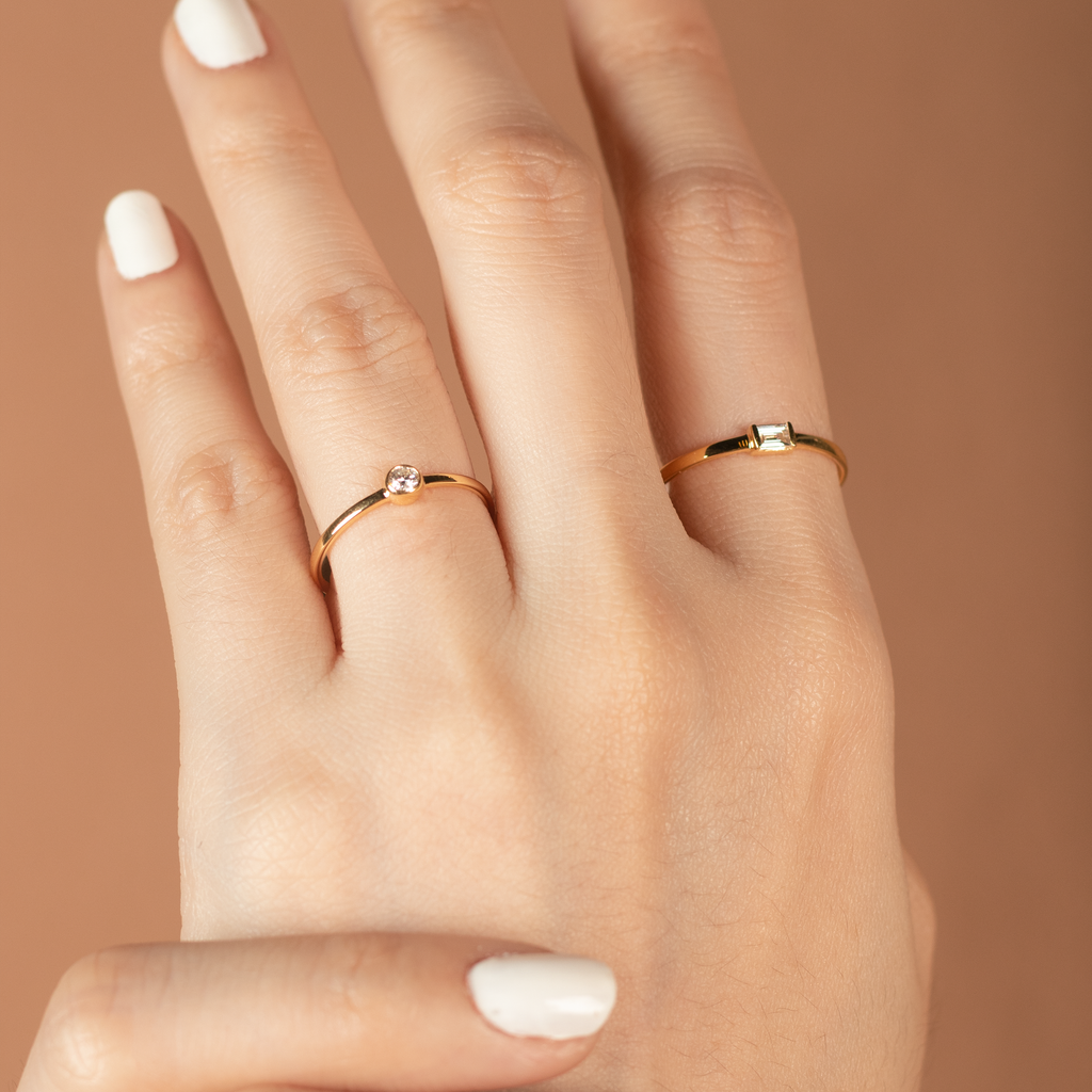 Solo Diamond Ring 14k gold stacked on model finger – Foundry