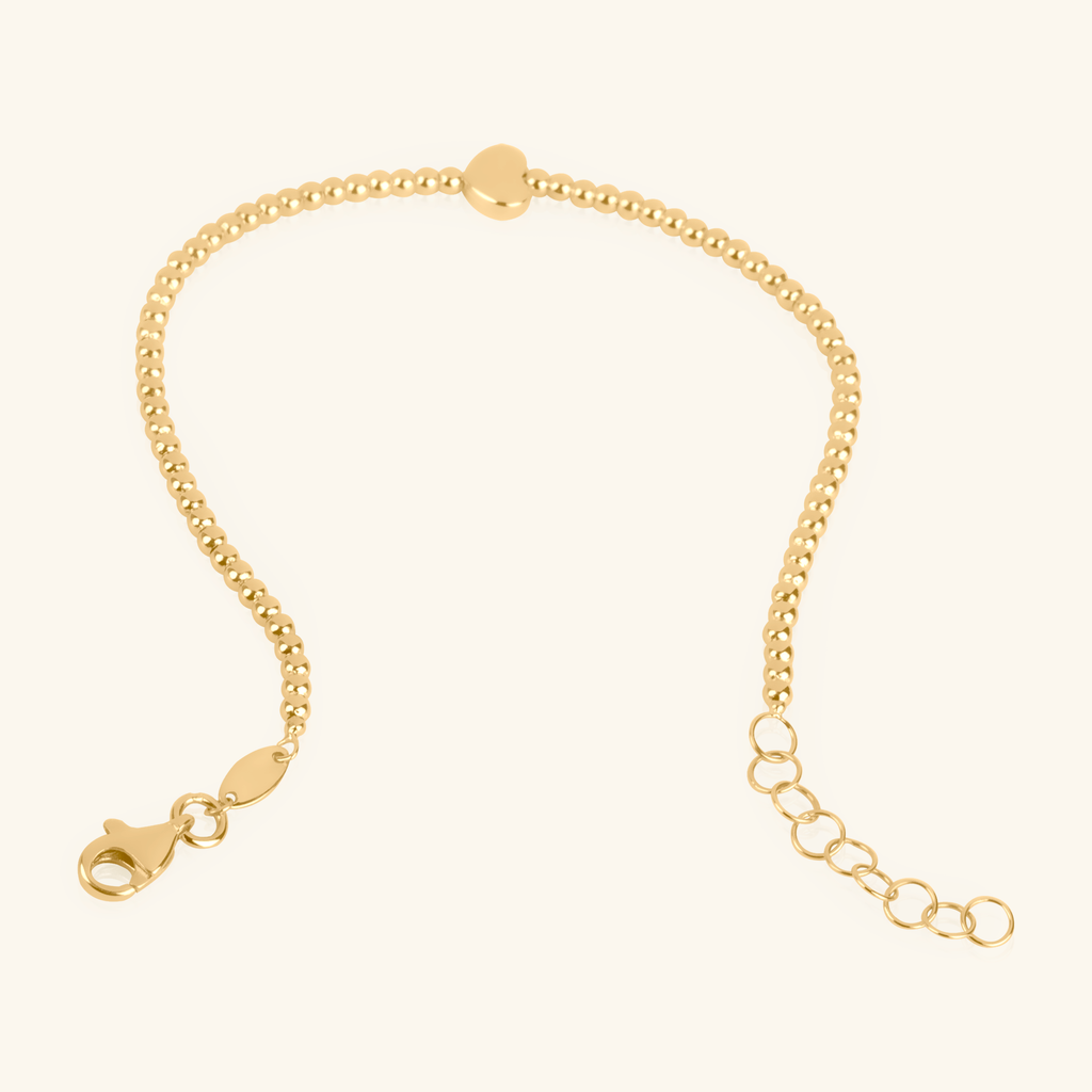 Close-up of lobster clasp on Solo Heart Spheres Bracelet 14k gold – Foundry
