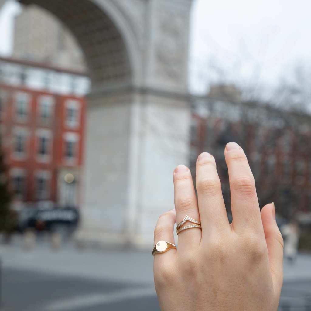 Solo Oxford Signet Ring 18k gold stacked on model finger – Foundry
