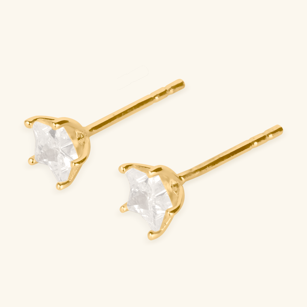 Close-up of push back post lock on Star Cut Studs 14k gold – Foundry