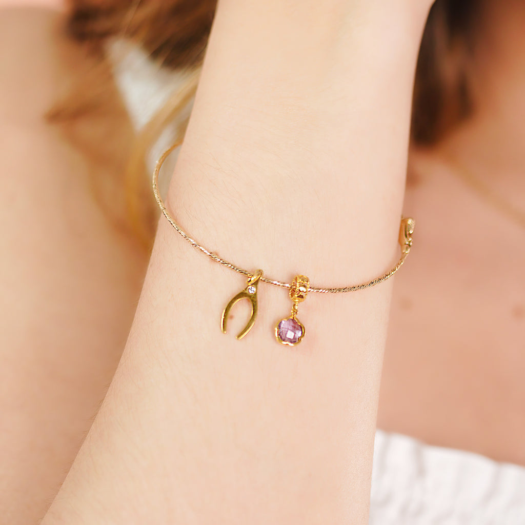 Thin Flexi Bangle 14k gold stacked with bangles on model wrist – Foundry