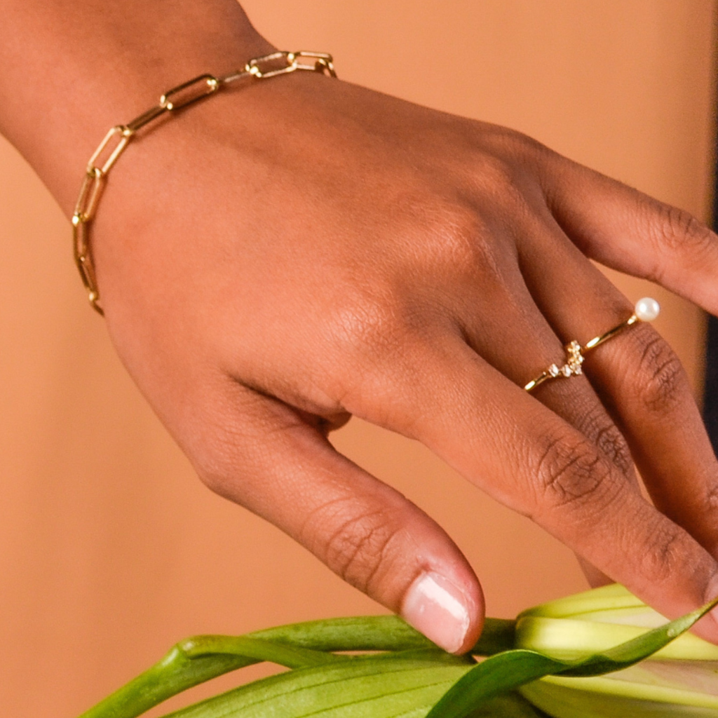 Wishbone Ring 14k gold stacked on model finger – Foundry