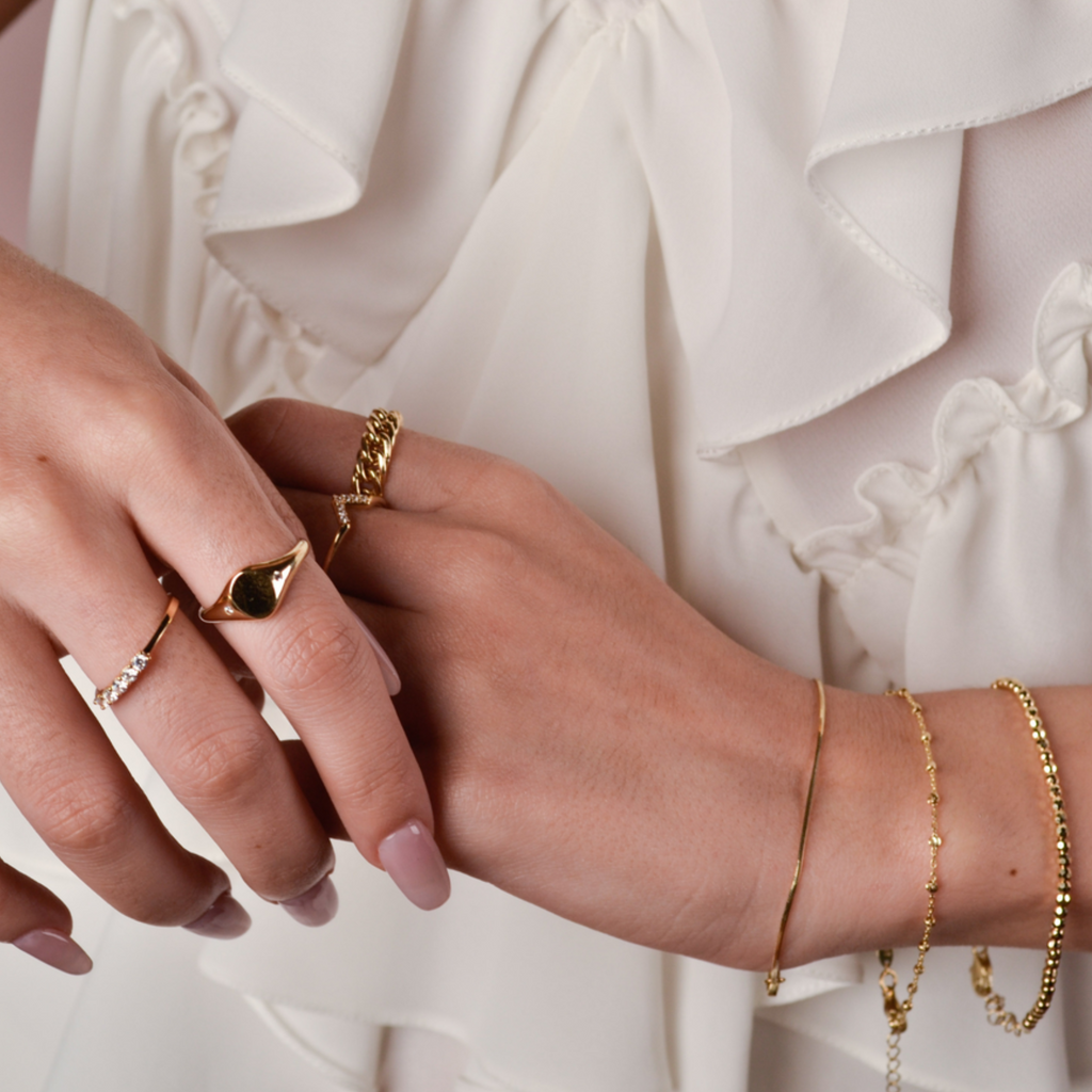 Wishbone Stacker Ring 14k gold stacked on model finger – Foundry