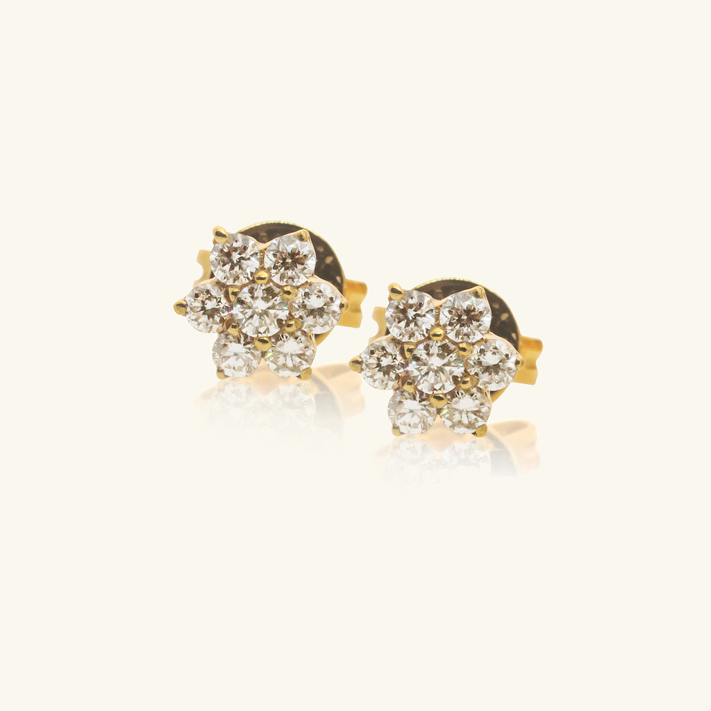 Flower Studs, Made in solid 14k gold. The brilliant round cut diamond is handcrafted with clean cut lines and maximum shine.