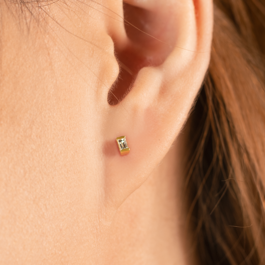 Baguette Diamond Studs, Made in solid 14k gold and set with baguette diamonds in bezel setting.