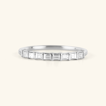 Baguette half eternity ring featuring 8 baguette diamonds set  in 14k solid gold