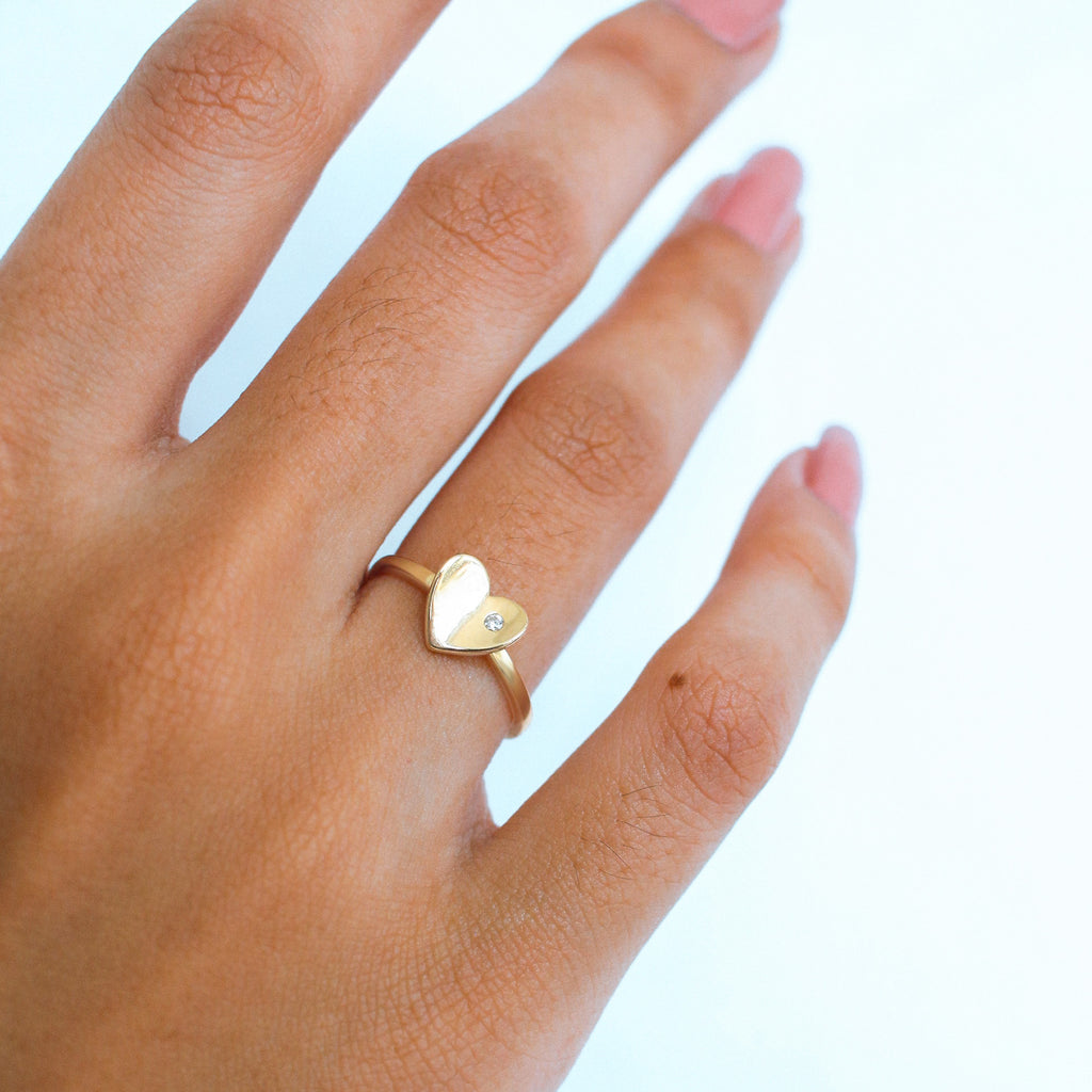 heart shape concave ring with cubic zirconia on ring finger. milestone ring for love and relationship Concave Heart Ring, Made in 18k soilid gold